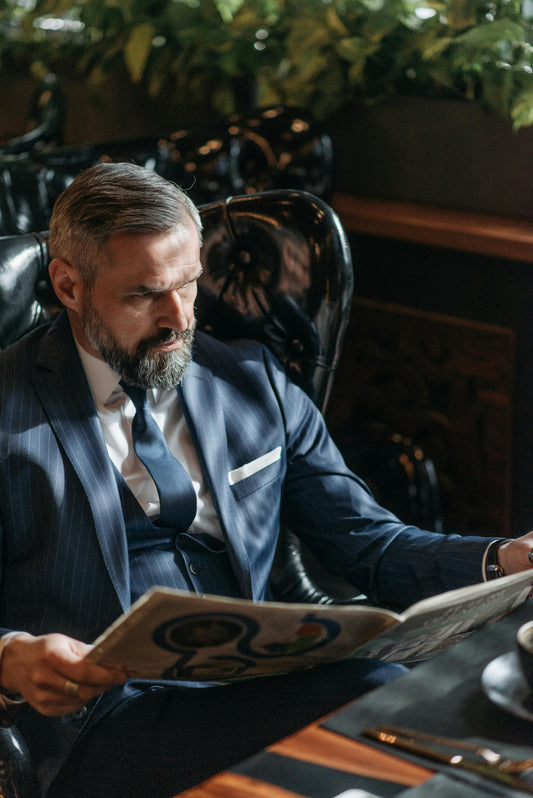 Men with Aging Beard Thinking About Dying His Beard