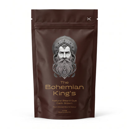 A dark brown stand-up pouch of 'The Bohemian King's' Natural Beard Dye in Dark Brown, featuring a detailed silver illustration of a bearded king on the front. PPD Free Beard Dye