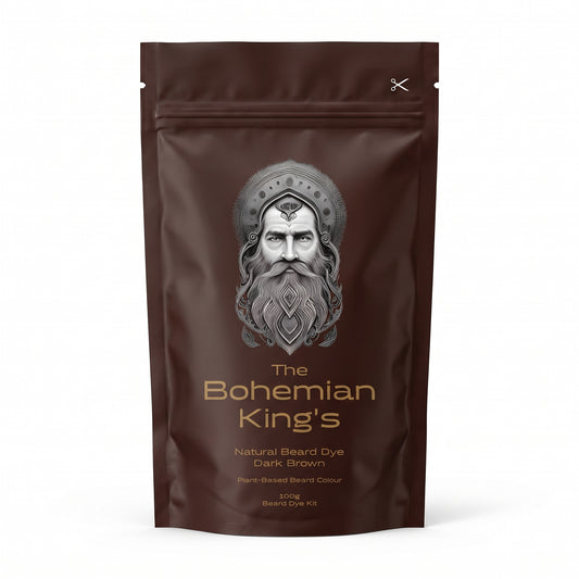 A dark brown stand-up pouch of 'The Bohemian King's' Natural Beard Dye in Dark Brown, featuring a detailed silver illustration of a bearded king on the front. PPD Free Beard Dye