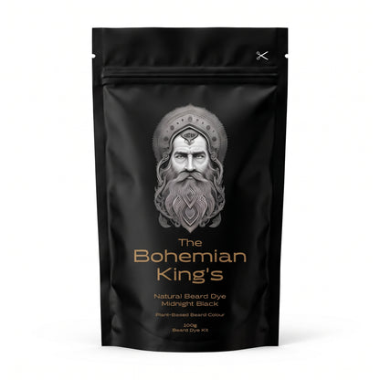 A black stand-up pouch package for 'The Bohemian King's Natural Beard Dye' in Midnight Black, featuring a detailed silver illustration of a bearded man's face on the front.